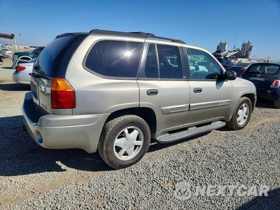 Trzecie zdjęcie samochodu z tyłu: 2003 GMC ENVOY VIN:1GKDT13S932370226 - miniatura