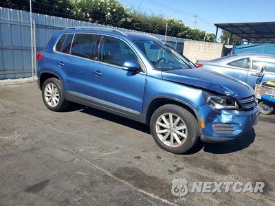 Czwarte zdjęcie samochodu z boku: 2017 VOLKSWAGEN TIGUAN WOLFSBURG VIN:WVGRV7AX3HK003452 - miniatura