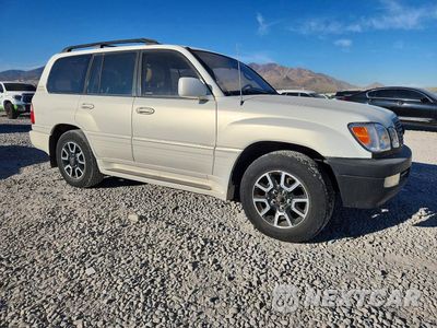 Czwarte zdjęcie samochodu z boku: 1998 LEXUS LX 470 VIN:JT6HT00WXW0020495 - miniatura