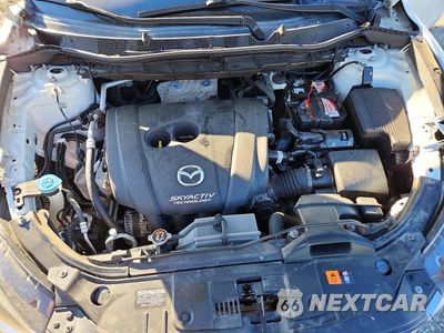 Zdjęcie 12 z 14 samochodu: 2014 MAZDA CX-5 TOURING VIN:JM3KE2CY7E0340462 - miniatura