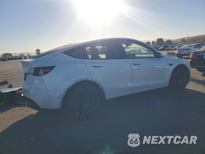Trzecie zdjęcie samochodu z tyłu: 2023 TESLA MODEL Y VIN:7SAYGDEE2PF585902 - miniatura