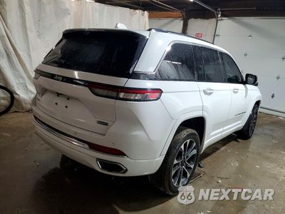 Trzecie zdjęcie samochodu z tyłu: 2022 JEEP GRAND CHEROKEE OVERLAND VIN:1C4RJHDG2N8563585 - miniatura