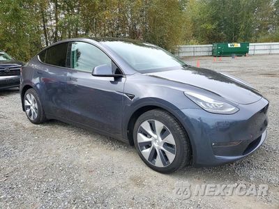 Czwarte zdjęcie samochodu z boku: 2021 TESLA MODEL Y VIN:5YJYGDEE3MF241343 - miniatura