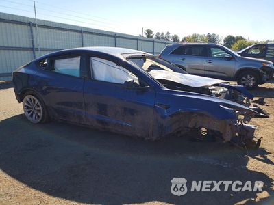 Czwarte zdjęcie samochodu z boku: 2023 TESLA MODEL 3 VIN:5YJ3E1EA1PF434204 - miniatura