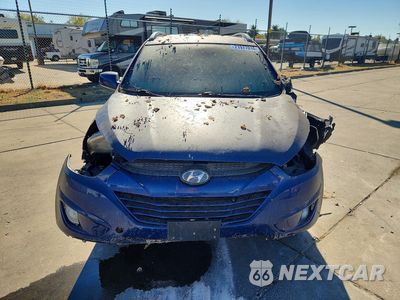 Piąte zdjęcie samochodu w środku: 2014 HYUNDAI TUCSON SE VIN:KM8JUCAG8EU899658 - miniatura