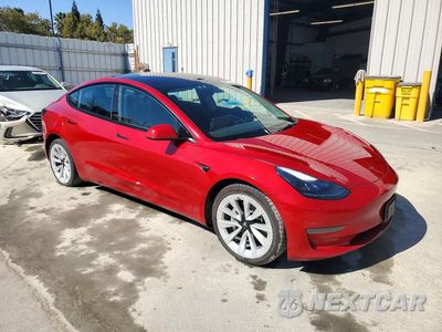 Czwarte zdjęcie samochodu z boku: 2022 TESLA MODEL 3 VIN:5YJ3E1EAXNF303978 - miniatura