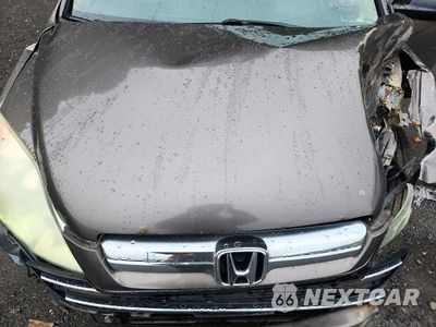 Zdjęcie 12 z 13 samochodu: 2009 HONDA CR-V EX VIN:3CZRE48539G703465 - miniatura