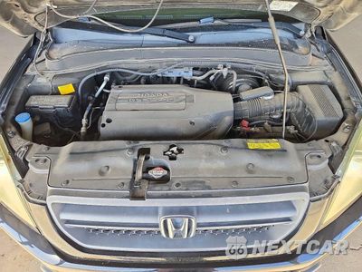 Zdjęcie 12 z 13 samochodu: 2004 HONDA PILOT EXL VIN:2HKYF18584H623141 - miniatura
