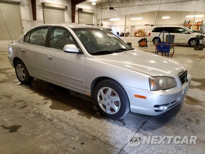 Czwarte zdjęcie samochodu z boku: 2004 HYUNDAI ELANTRA GLS VIN:KMHDN46D24U850159 - miniatura