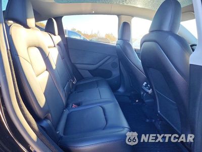 Zdjęcie 10 z 13 samochodu: 2023 TESLA MODEL Y VIN:7SAYGDEE7PA181796 - miniatura