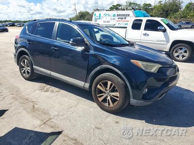 Czwarte zdjęcie samochodu z boku: 2017 TOYOTA RAV4 XLE VIN:2T3WFREV7HW391270 - miniatura