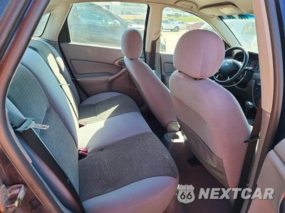 Zdjęcie 10 z 12 samochodu: 2004 FORD FOCUS LX VIN:1FAFP33P44W201800 - miniatura