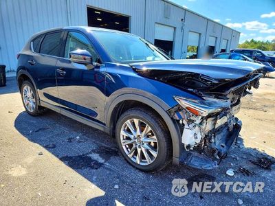 Czwarte zdjęcie samochodu z boku: 2021 MAZDA CX-5 GRAND TOURING VIN:JM3KFADM6M0400040 - miniatura