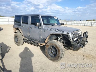 Czwarte zdjęcie samochodu z boku: 2016 JEEP WRANGLER UNLIMITED SPORT VIN:1C4BJWDGXGL162579 - miniatura