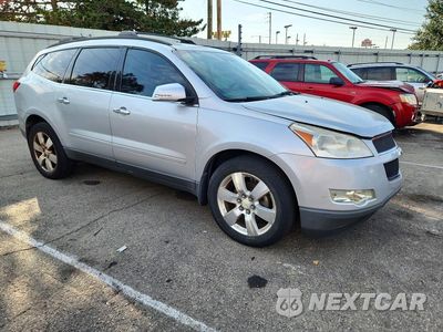 Czwarte zdjęcie samochodu z boku: 2012 CHEVROLET TRAVERSE LT VIN:1GNKRGED6CJ375674 - miniatura