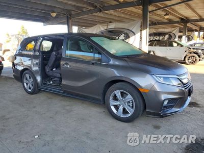 Czwarte zdjęcie samochodu z boku: 2018 HONDA ODYSSEY EX VIN:5FNRL6H5XJB104399 - miniatura