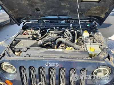 Zdjęcie 11 z 12 samochodu: 2008 JEEP WRANGLER SAHARA VIN:1J8FA54128L523630 - miniatura