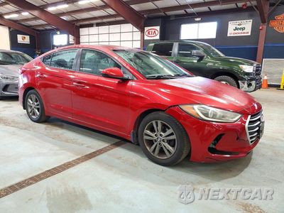 Czwarte zdjęcie samochodu z boku: 2017 HYUNDAI ELANTRA VALUE EDITION VIN:5NPD84LF9HH210533 - miniatura