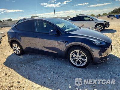 Czwarte zdjęcie samochodu z boku: 2023 TESLA MODEL Y VIN:7SAYGDEE4PA106702 - miniatura