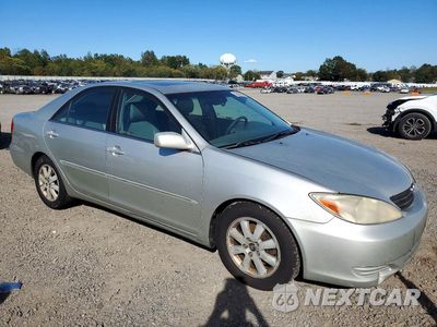 Czwarte zdjęcie samochodu z boku: 2002 TOYOTA CAMRY XLE V6 VIN:4T1BF30K02U538022 - miniatura