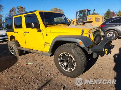 Czwarte zdjęcie samochodu z boku: 2015 JEEP WRANGLER UNLIMITED SPORT VIN:1C4BJWDG9FL711106 - miniatura