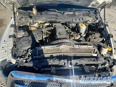 Zdjęcie 11 z 12 samochodu: 2014 RAM 2500 LONGHORN VIN:3C6UR5GL2EG244053 - miniatura