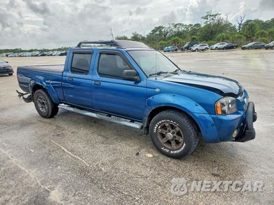 Czwarte zdjęcie samochodu z boku: 2004 NISSAN FRONTIER CREW CAB XE V6 VIN:1N6ED29X44C437667 - miniatura