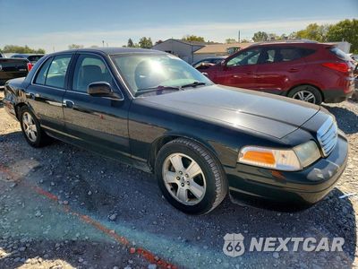 Czwarte zdjęcie samochodu z boku: 2011 FORD CROWN VICTORIA LX VIN:2FABP7EV3BX154472 - miniatura