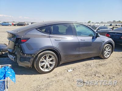 Trzecie zdjęcie samochodu z tyłu: 2023 TESLA MODEL Y VIN:7SAYGDEE2PF906093 - miniatura