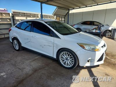 Czwarte zdjęcie samochodu z boku: 2012 FORD FOCUS SEL VIN:1FAHP3H22CL371577 - miniatura