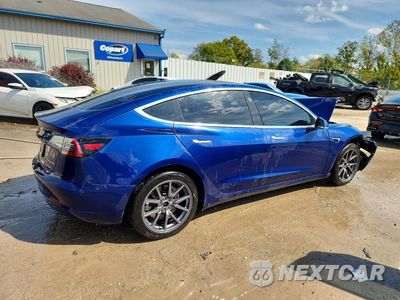 Trzecie zdjęcie samochodu z tyłu: 2019 TESLA MODEL 3 VIN:5YJ3E1EB3KF465150 - miniatura