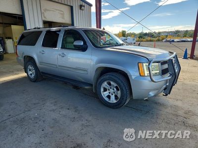 Czwarte zdjęcie samochodu z boku: 2011 CHEVROLET SUBURBAN K1500 LT VIN:1GNSKJE31BR209829 - miniatura