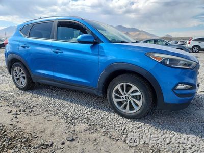 Czwarte zdjęcie samochodu z boku: 2016 HYUNDAI TUCSON SE VIN:KM8J33A44GU175719 - miniatura