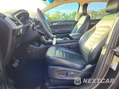 Zdjęcie 7 z 13 samochodu: 2015 FORD EDGE SEL VIN:2FMTK4J90FBB88243 - miniatura