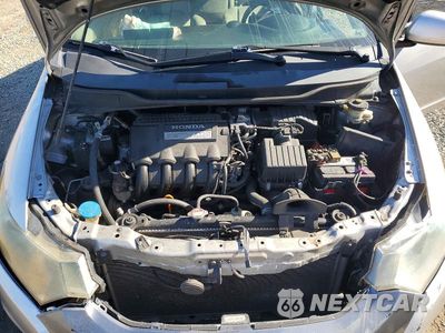 Zdjęcie 11 z 12 samochodu: 2010 HONDA INSIGHT EX VIN:JHMZE2H72AS007946 - miniatura