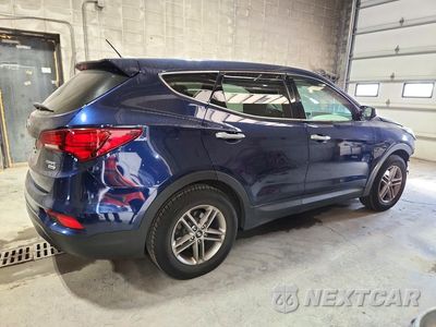 Trzecie zdjęcie samochodu z tyłu: 2018 HYUNDAI SANTA FE SPORT 2.4L VIN:5XYZTDLB7JG559253 - miniatura