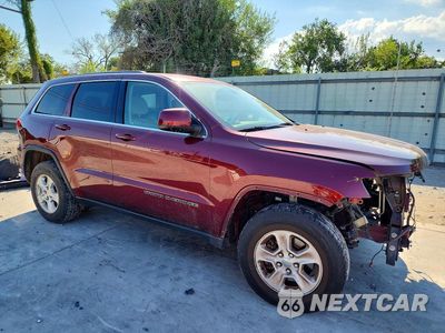 Czwarte zdjęcie samochodu z boku: 2017 JEEP GRAND CHEROKEE LAREDO VIN:1C4RJEAG9HC712613 - miniatura