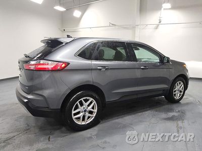 Trzecie zdjęcie samochodu z tyłu: 2022 FORD EDGE SEL VIN:2FMPK4J96NBA92567 - miniatura