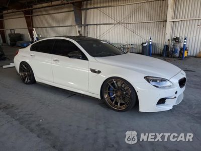 Czwarte zdjęcie samochodu z boku: 2014 BMW M6 GRAN COUPE VIN:WBS6C9C55ED466819 - miniatura