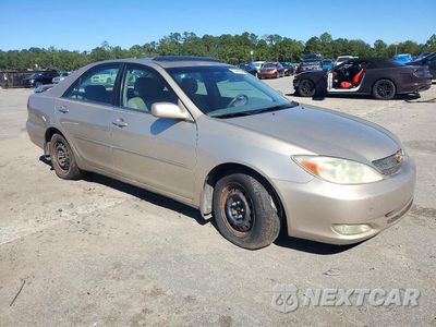 Czwarte zdjęcie samochodu z boku: 2003 TOYOTA CAMRY XLE V6 VIN:4T1BF30K13U553713 - miniatura