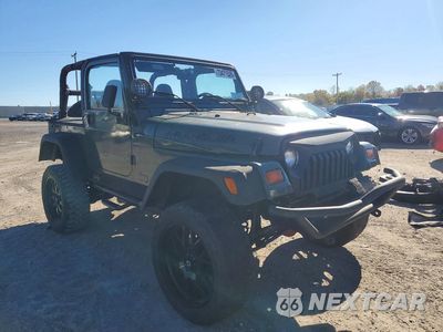 Czwarte zdjęcie samochodu z boku: 1999 JEEP WRANGLER / TJ SPORT VIN:1J4FY19S1XP460132 - miniatura