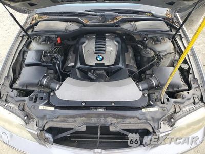 Zdjęcie 11 z 12 samochodu: 2006 BMW 750 LI VIN:WBAHN83576DT32798 - miniatura