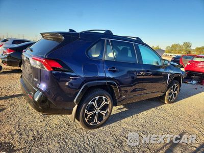 Trzecie zdjęcie samochodu z tyłu: 2024 TOYOTA RAV4 PRIME XSE VIN:JTMEB3FV3RD200395 - miniatura