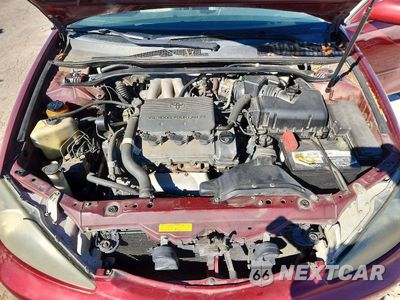 Zdjęcie 11 z 12 samochodu: 2002 TOYOTA CAMRY SE V6 VIN:JTDBF30K920048898 - miniatura