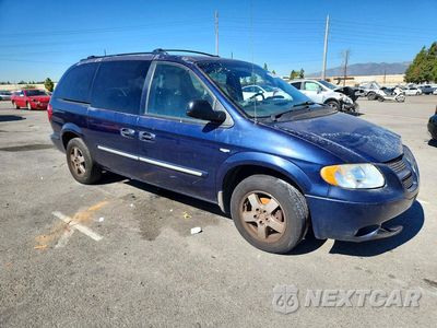 Czwarte zdjęcie samochodu z boku: 2004 DODGE GRAND CARAVAN SXT VIN:2D4GP44L74R519759 - miniatura