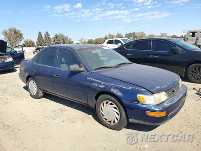 Czwarte zdjęcie samochodu z boku: 1997 TOYOTA COROLLA BASE VIN:1NXBA02E6VZ537871 - miniatura