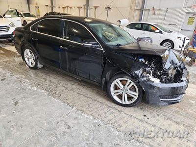 Czwarte zdjęcie samochodu z boku: 2014 VOLKSWAGEN PASSAT SE VIN:1VWBN7A35EC112811 - miniatura