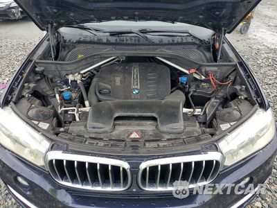 Zdjęcie 12 z 13 samochodu: 2014 BMW X5 XDRIVE35D VIN:5UXKS4C52E0J97065 - miniatura
