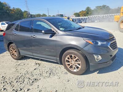 Czwarte zdjęcie samochodu z boku: 2019 CHEVROLET EQUINOX LT VIN:2GNAXKEV3K6104807 - miniatura