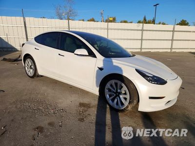Czwarte zdjęcie samochodu z boku: 2022 TESLA MODEL 3 VIN:5YJ3E1EB5NF144229 - miniatura